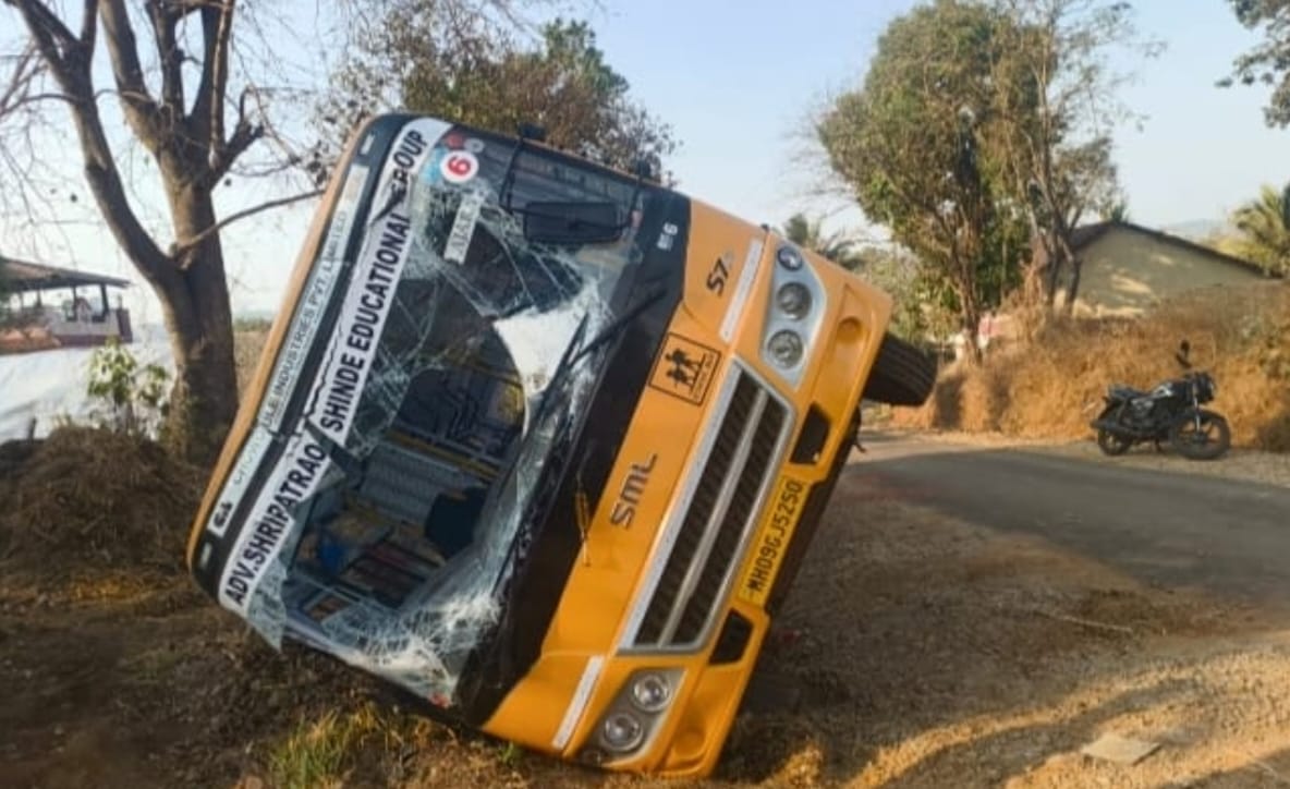 School bus overturns